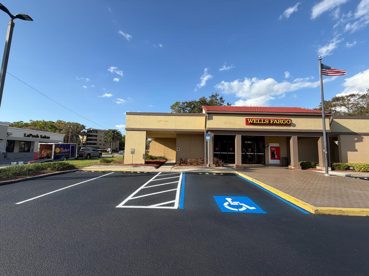 Wells Fargo Clearwater parking lot sealcoating and ADA handicap striping by Radiant Striping