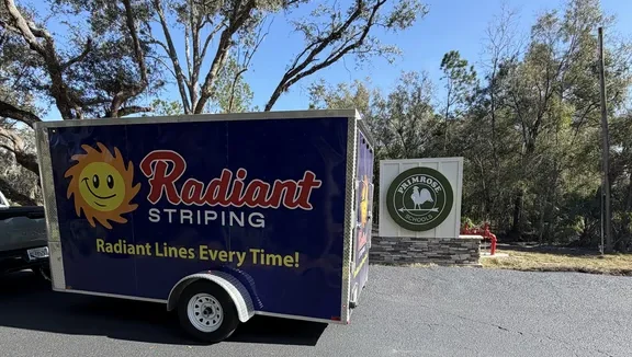 Radiant Striping trailer on site at Primrose School in Wesley Chapel, Florida