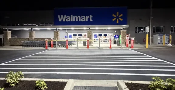Fresh parking lot striping at Walmart in Sarasota, Florida, completed overnight by Radiant Striping